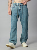 Men's light blue washed baggy denim jeans with elastic waistband and adjustable drawstring – front view