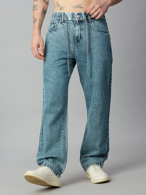 Men's light blue washed baggy denim jeans with elastic waistband and adjustable drawstring – front view