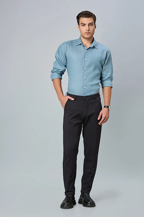 Model wearing LOFA men’s formal stretchable trousers – timeless design and perfect fit for work or smart occasions.