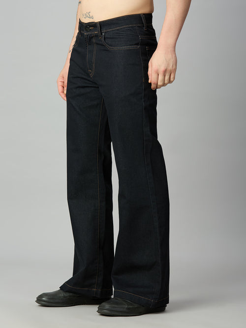 Premium deep blue bootcut jeans for men with a clean denim finish – left side view