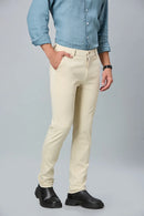 Side view of beige slim fit formal trousers for men – LOFA comfort stretch design with wrinkle-resistant fabric.