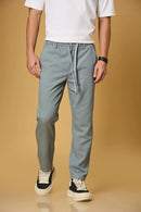 Men’s Aqua Blue Tencel-cotton trousers front view – comfort fit with press button and waist string.