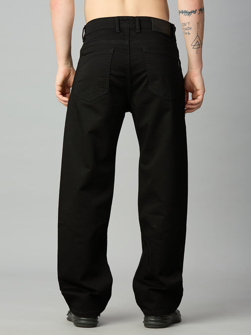 Men's black baggy fit denim jeans with classic back pocket construction – back view