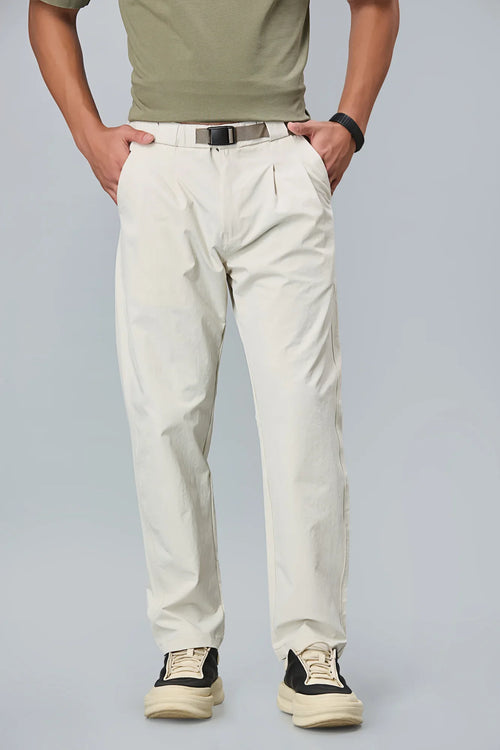 Men’s beige polyester trousers front view – comfort fit with double pleats and belt.