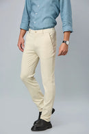 Side view of beige slim fit formal trousers for men – LOFA comfort stretch design with wrinkle-resistant fabric.