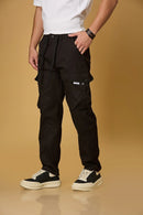 black pants side view showing double cargo pockets and relaxed fit.