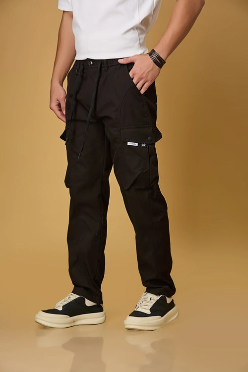 black pants side view showing double cargo pockets and relaxed fit.
