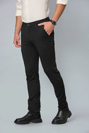 Side view of Black slim fit formal trousers for men – LOFA comfort stretch design with wrinkle-resistant fabric.