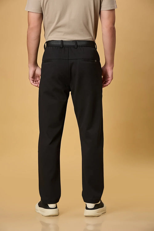 Back view of LOFA Black straight fit formal trousers – clean seams, tailored back pockets, and premium stretch fabric.