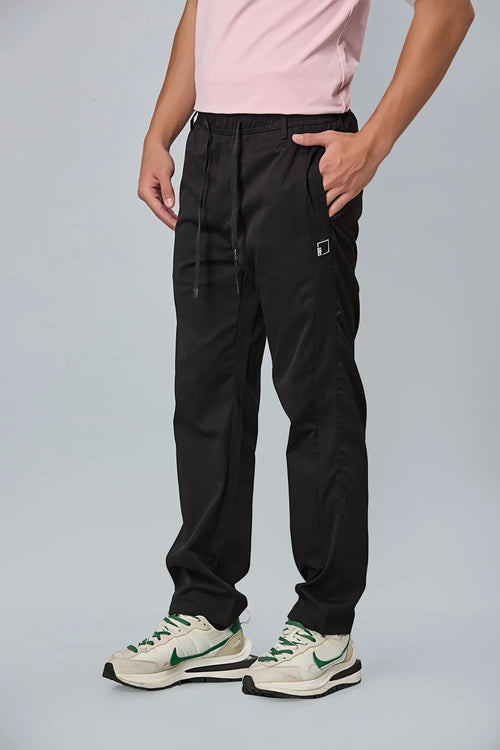 Side View of LOFA black Comfort Fit Polyester Trousers with Waist Strings
