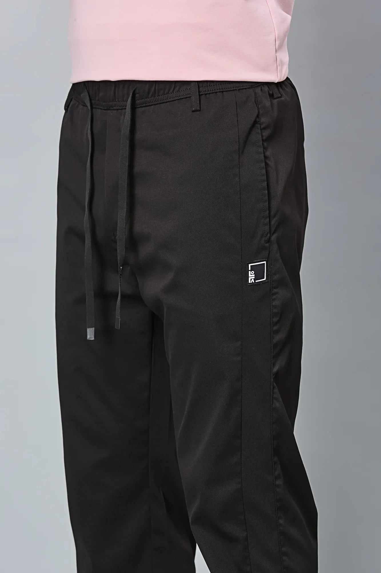 Waist String Detail on LOFA Men’s black Comfort Fit Stretchable Activewear Trousers