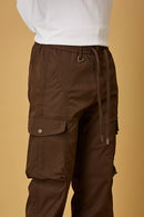 Close-up of Coffee Brown cargo pants, waist string and pocket detailing.