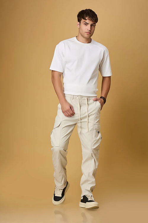 LOFA beige cargo pants styled for men – casual and versatile everyday look.