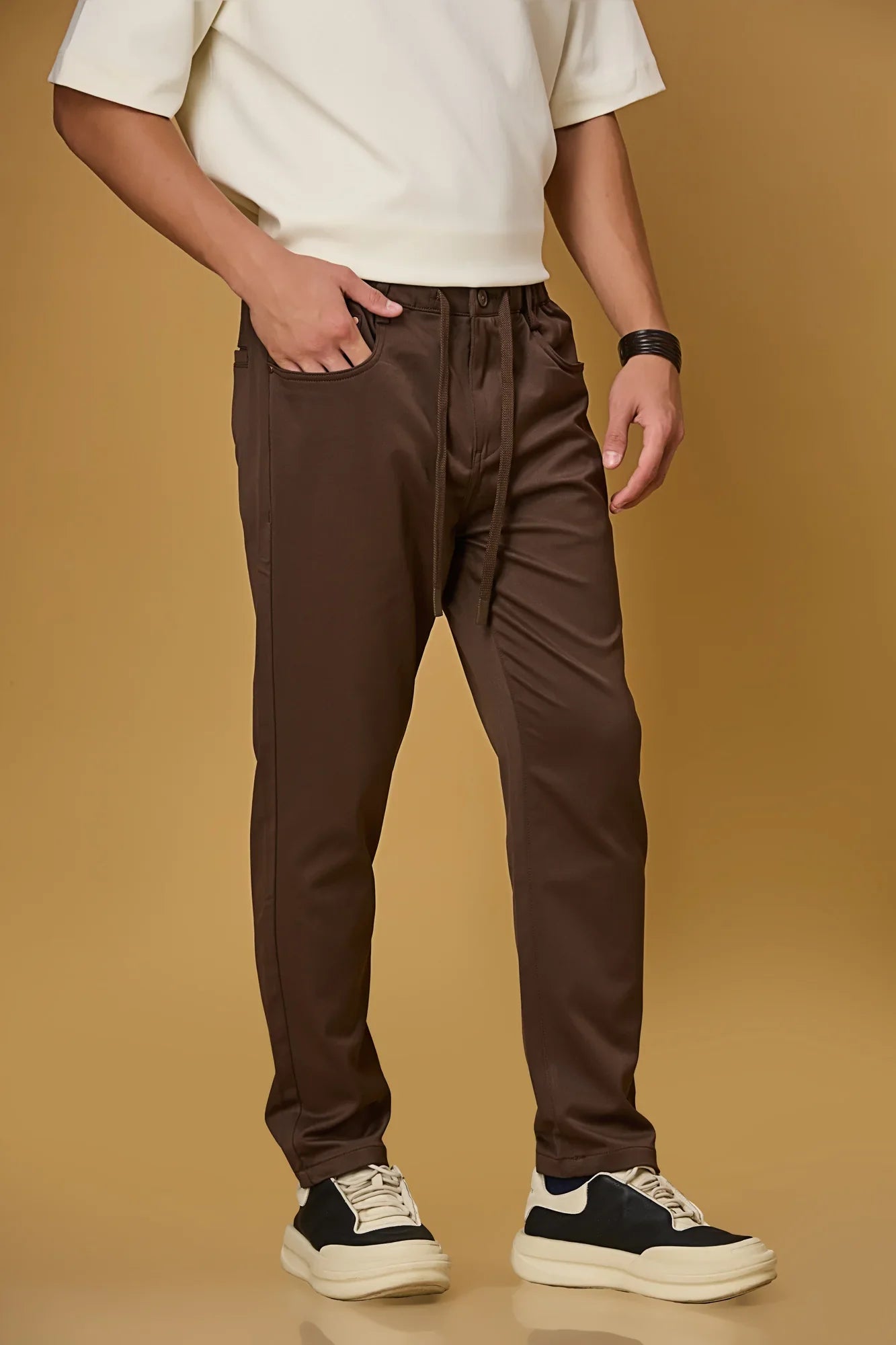 Coffee Brown stretchable trousers side view showing casual comfort fit.