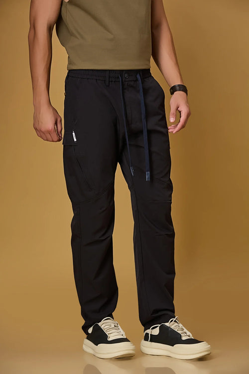 Navy Blue stretchable trousers side view showing two side pockets and relaxed fit.