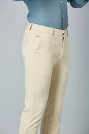 Close-up of cotton–polyester–spandex fabric showing fine stitching and smooth stretch texture of LOFA beige formal trousers.