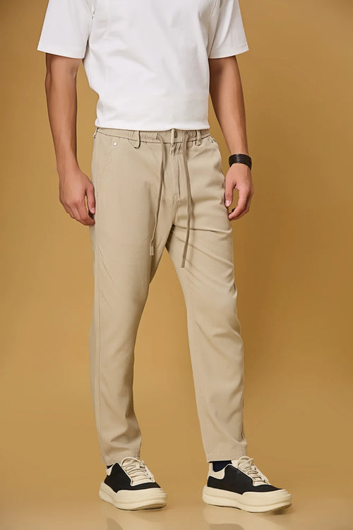 Light khaki trousers side view showing comfort fit and adjustable waist.