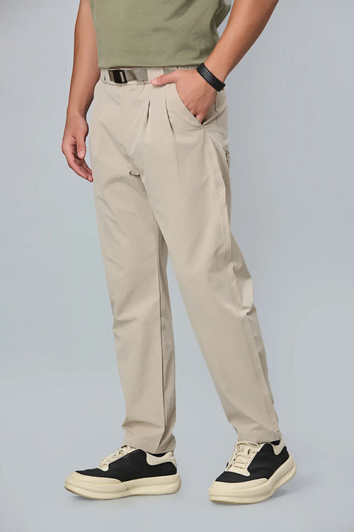 khaki stretchable trousers side view showing comfort fit and pleated front.
