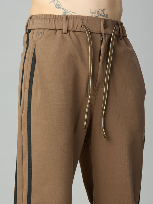 Close-up of contrast side stripe detailing on premium cotton-Tencel smart pants