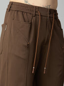 Close-up of the uniquely designed front utility pocket with premium stitching and textured Tencel stretch fabric.