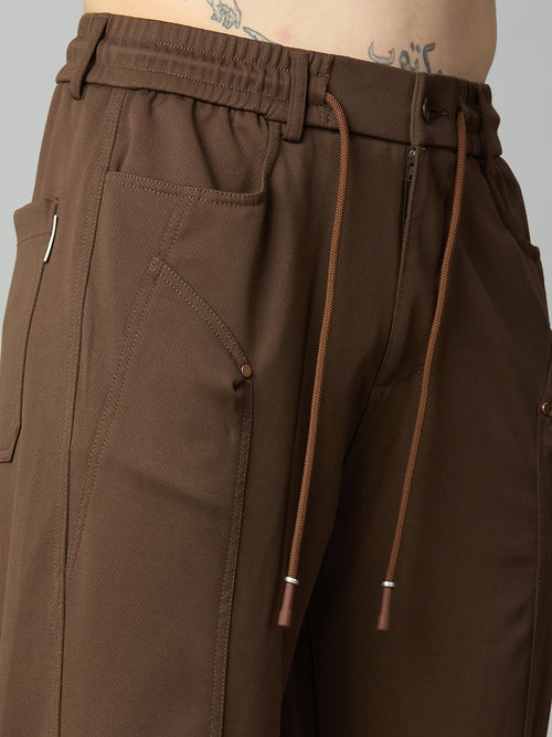 Close-up of the uniquely designed front utility pocket with premium stitching and textured Tencel stretch fabric.