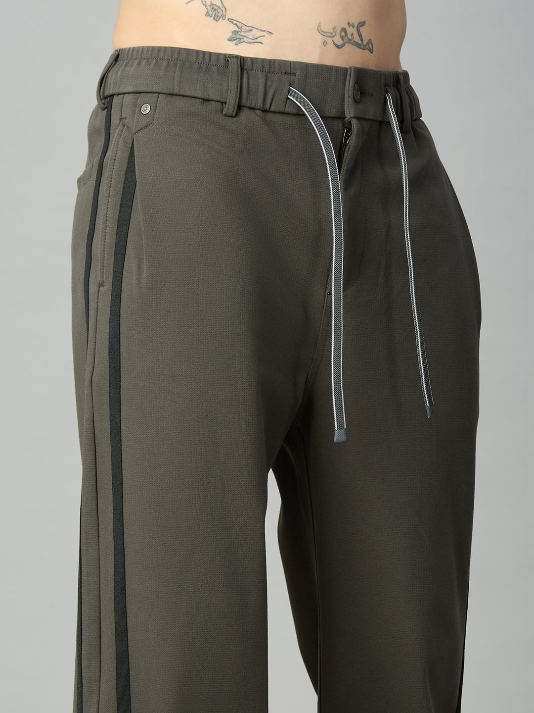 Close-up of contrast side stripe detailing on premium cotton-Tencel smart pants