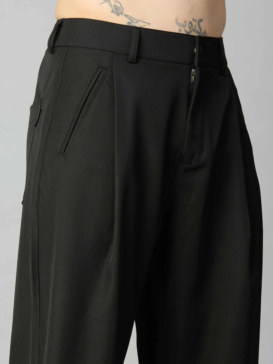 Close-up of tailored front pleat detailing