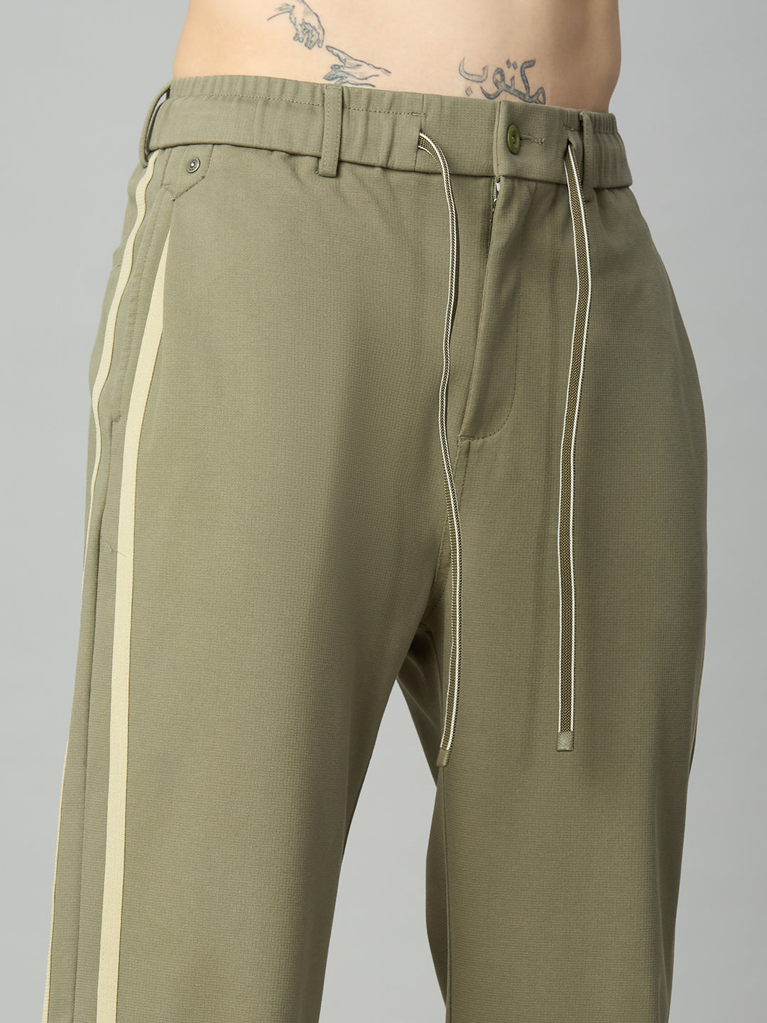 Close-up of contrast side stripe detailing on premium cotton-Tencel smart pants