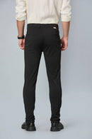 Back view of LOFA Black slim fit formal trousers – clean seams, tailored structure, and premium cotton stretch fabric.