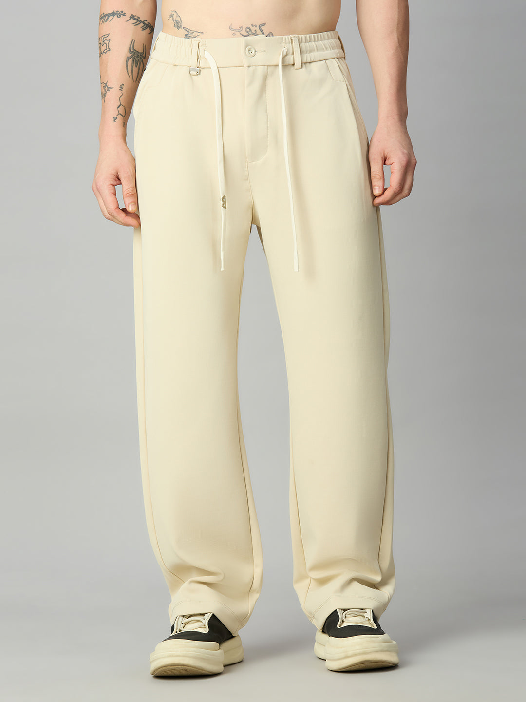Men's relaxed fit Tencel stretch pants with textured fabric and drawstring waist – front view
