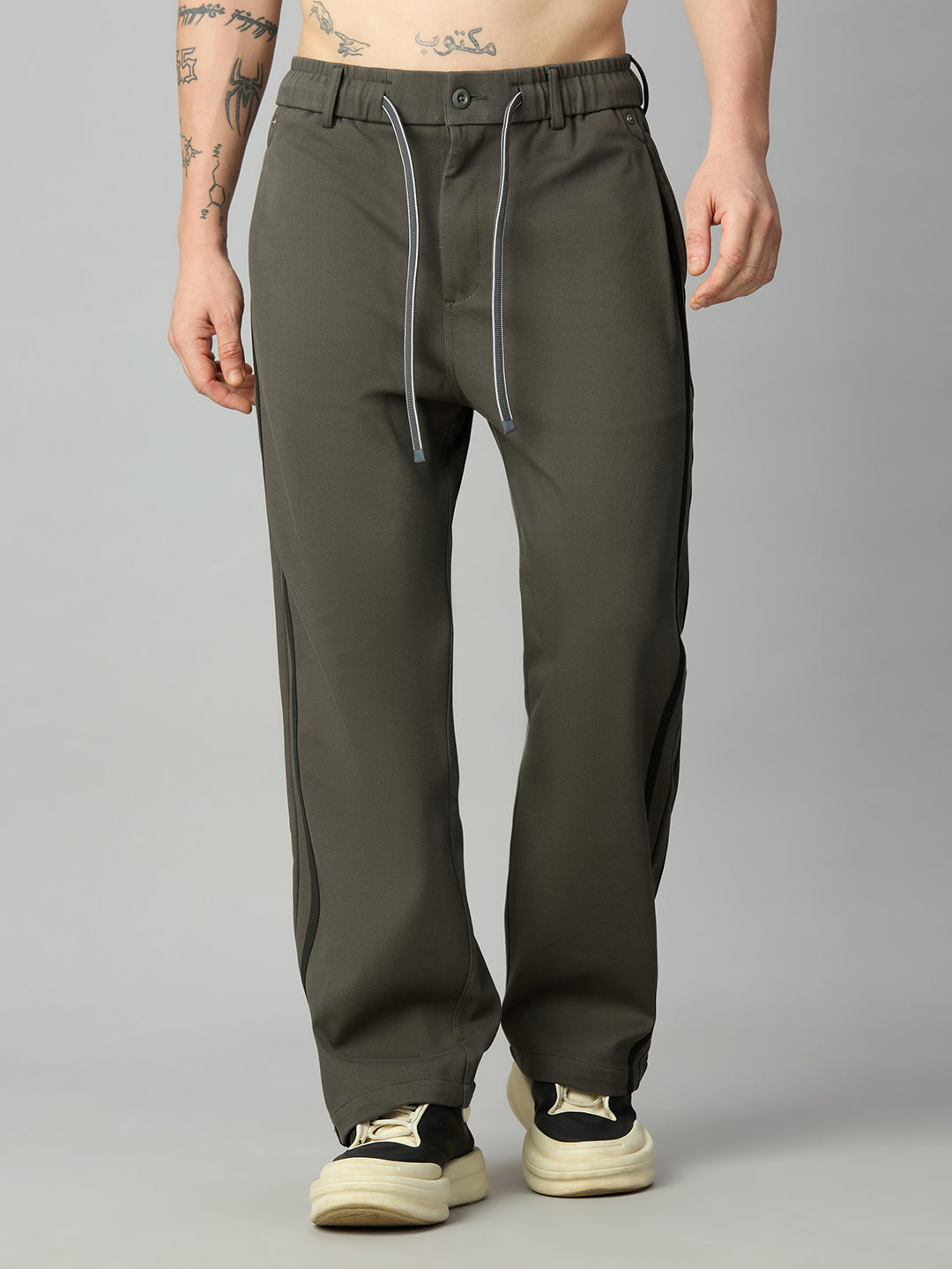 Men's baggy smart pants with side stripes and adjustable drawstring waistband – front view