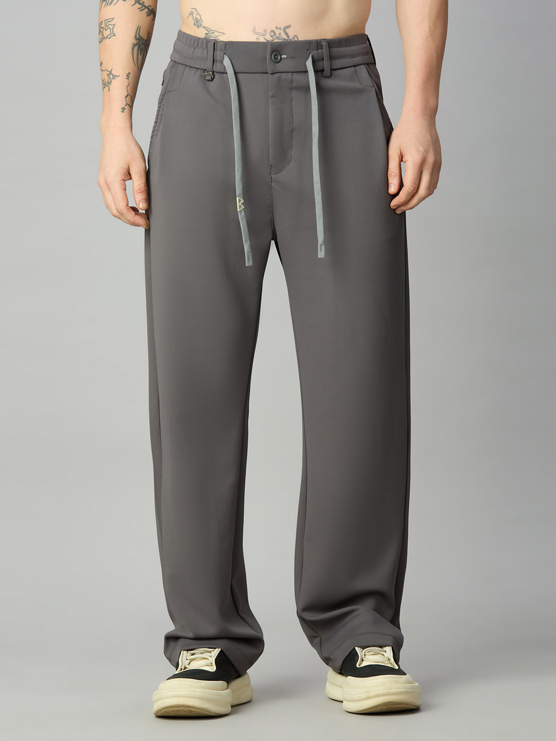 Men's relaxed fit Tencel stretch pants with textured fabric and drawstring waist – front view