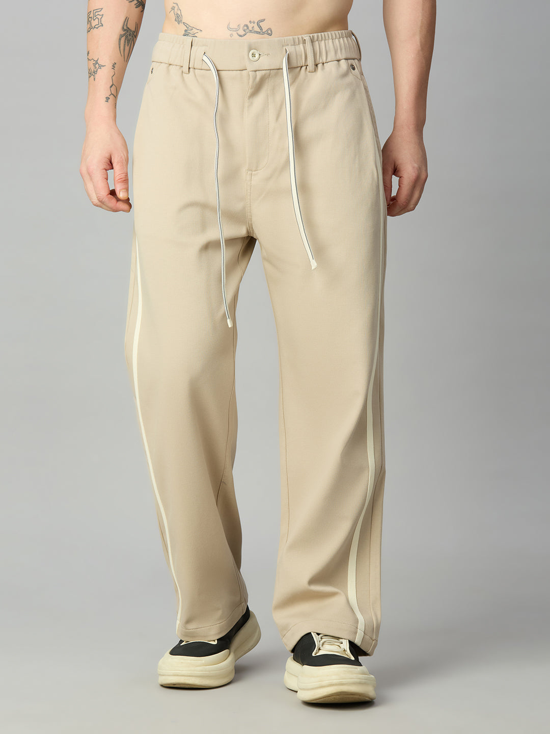 Men's baggy smart pants with side stripes and adjustable drawstring waistband – front view