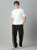 Model wearing Lofa™ baggy smart pants with side stripes styled for modern streetwear and casual everyday wear