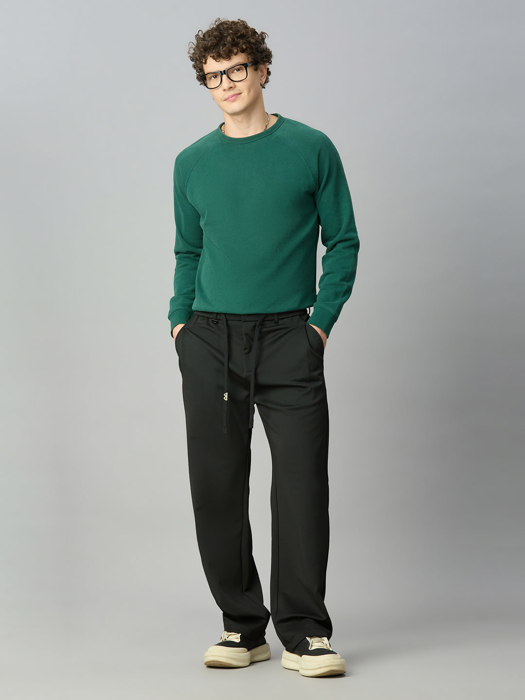 Model wearing Lofa™ relaxed fit Tencel stretch pants styled for everyday comfort and modern casual wear