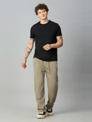 Model wearing Lofa™ relaxed fit Tencel stretch pants styled for everyday comfort and modern casual wear