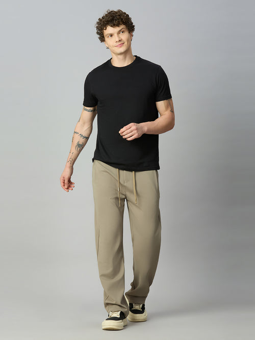 Model wearing Lofa™ relaxed fit Tencel stretch pants styled for everyday comfort and modern casual wear