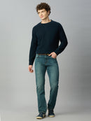 Model wearing The Lofa men's light blue-green straight fit denim jeans with an attached web belt for a modern casual look