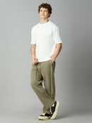 Model wearing Lofa™ baggy smart pants with side stripes styled for modern streetwear and casual everyday wear