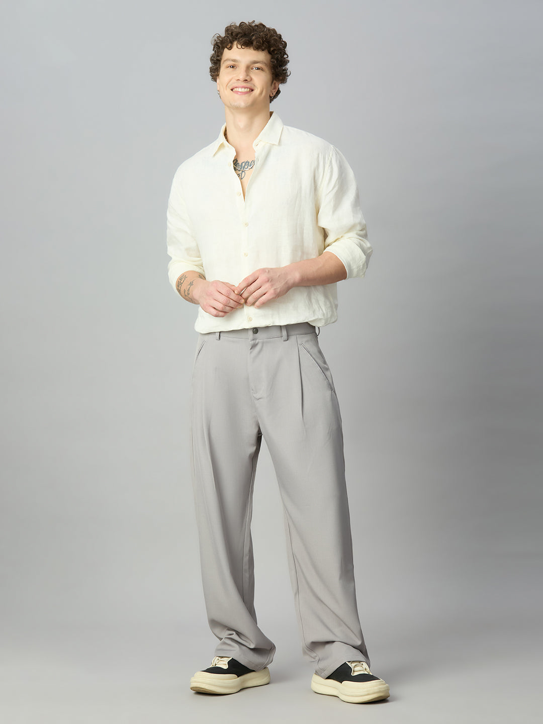 Model wearing Korean fit baggy Tencel pants with contemporary casual styling