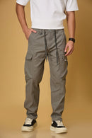 Men’s grey polyester cargo pants front view – casual fit trousers with waist string.
