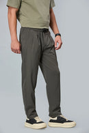 grey stretchable trousers side view showing comfort fit and pleated front.