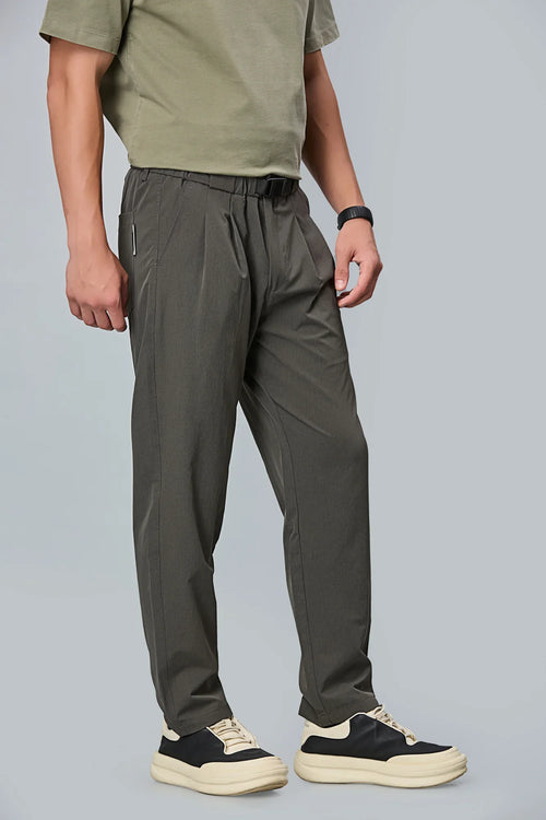 grey stretchable trousers side view showing comfort fit and pleated front.