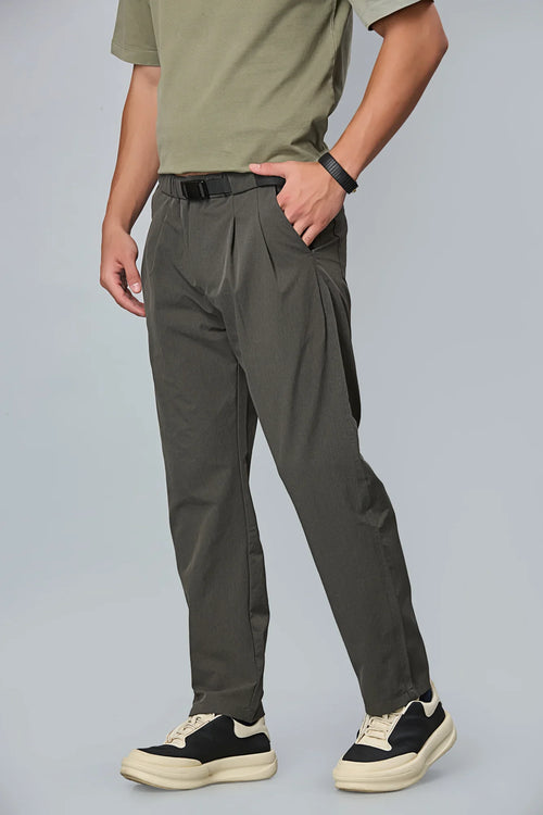 grey stretchable trousers side view showing comfort fit and pleated front.