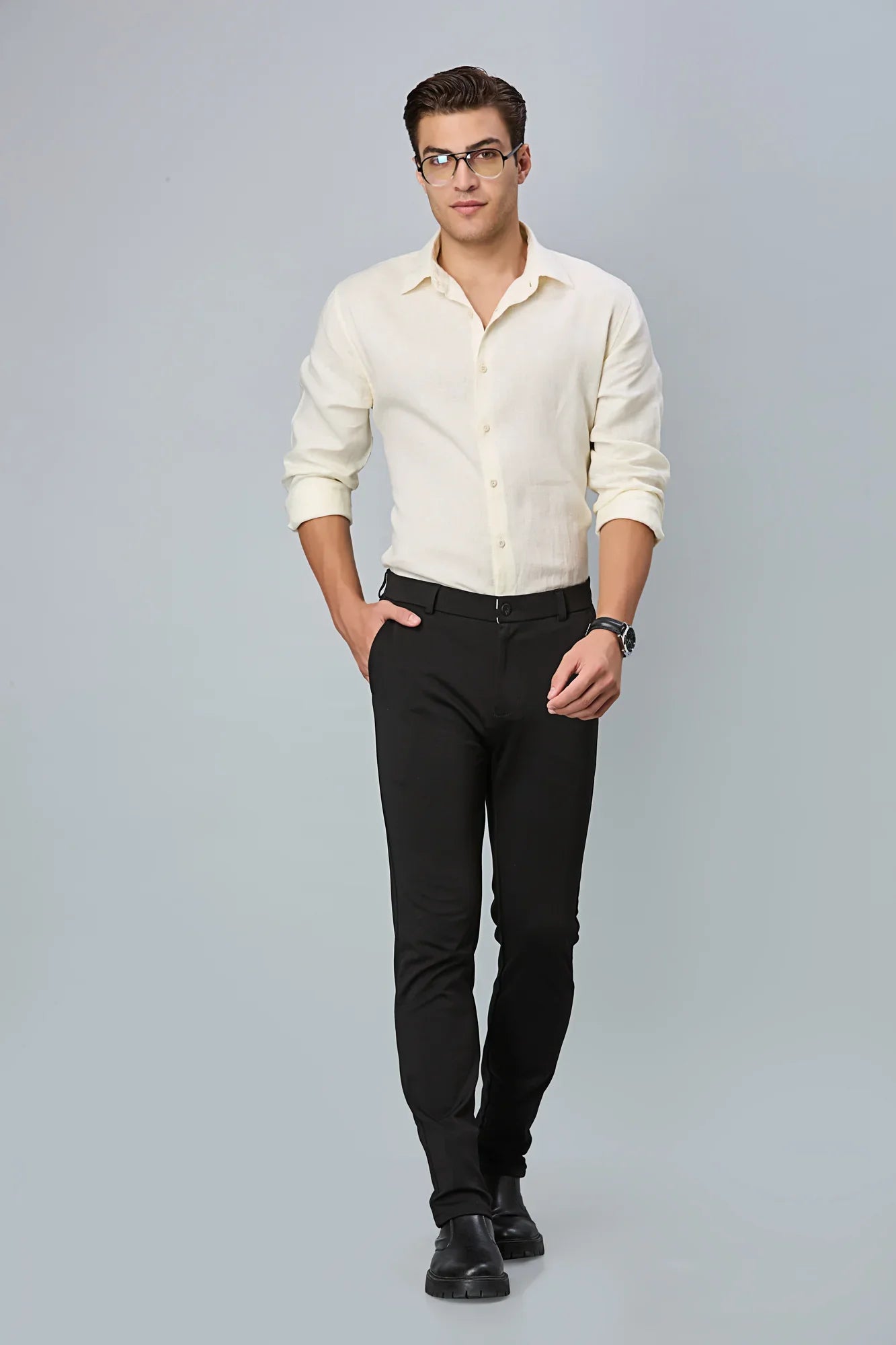 Model wearing LOFA Black slim fit formal trousers – modern stretch comfort and timeless design for men’s formal wear.