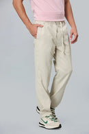 Side View of LOFA Cream Comfort Fit Polyester Trousers with Waist Strings