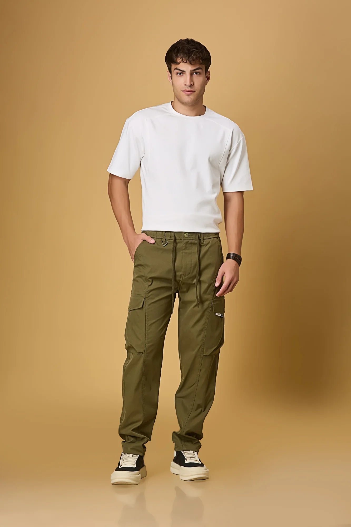 LOFA Mehndi Green cargo pants styled for men – casual and versatile everyday look.