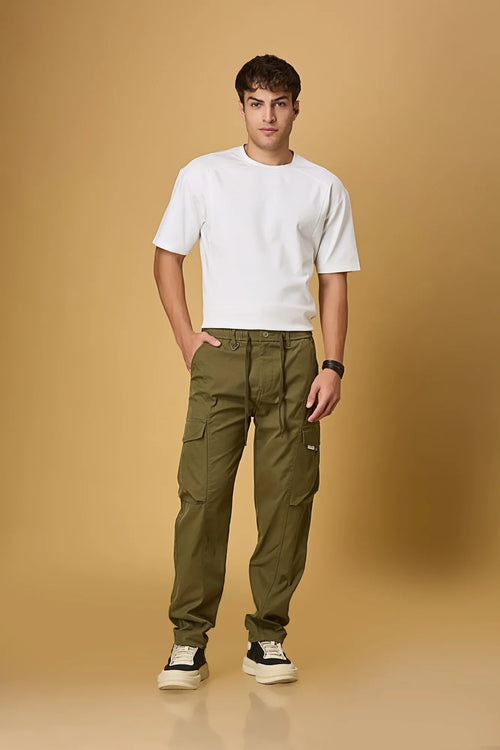 LOFA Mehndi Green cargo pants styled for men – casual and versatile everyday look.