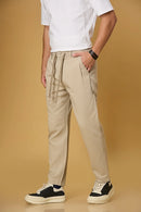 Light khaki trousers side view showing comfort fit and adjustable waist.