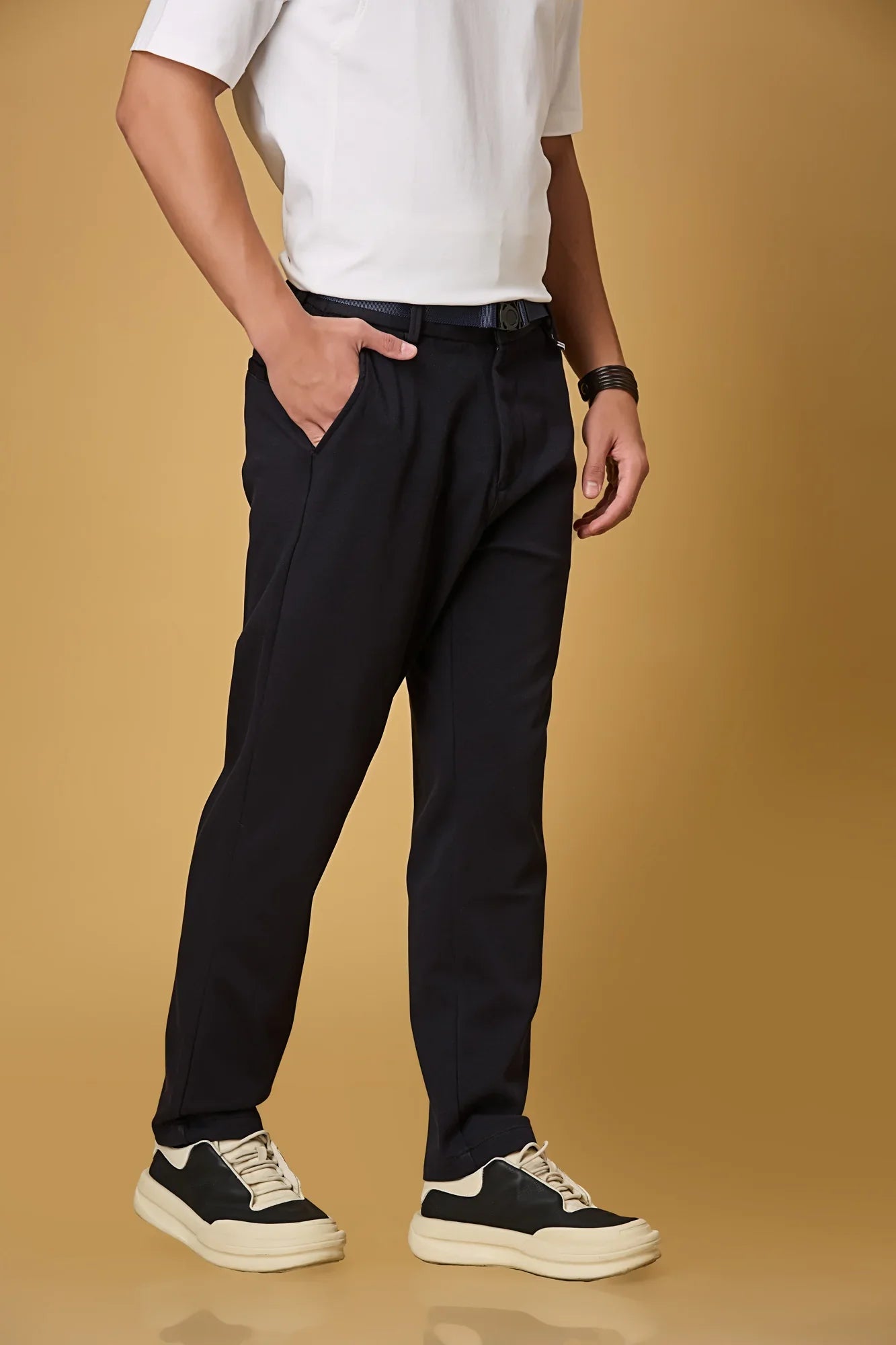Side view of navy blue straight fit formal trousers for men – LOFA stretchable Tencel cotton spandex blend with belt detail.